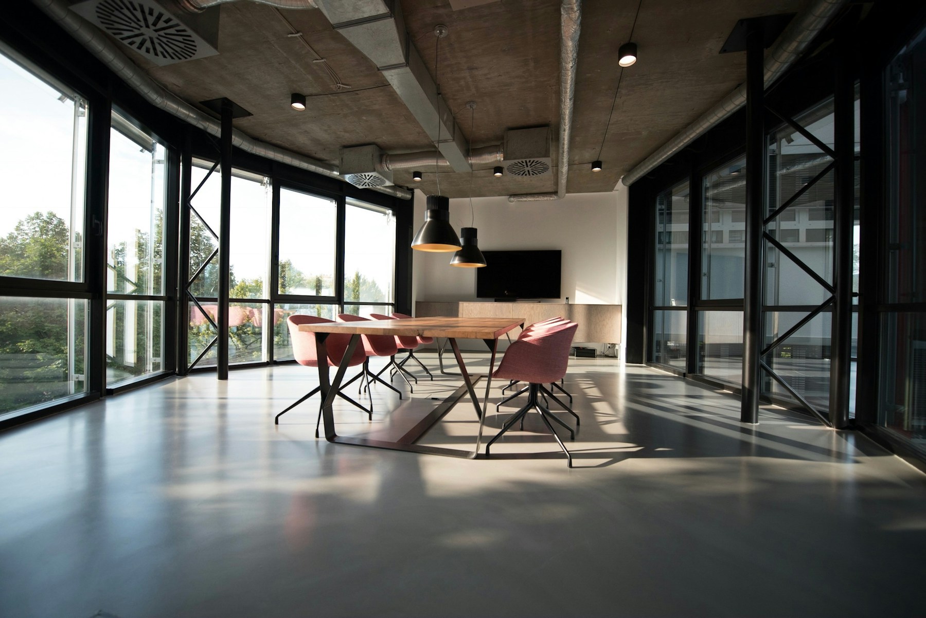 Refined timber and stone light-commercial building with a sheltered pedestrian edge